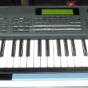 Roland XP-60 61-Key 64-Voice Synthesizer Music Workstation Keyboard w. case