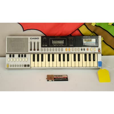 Used Casio PT-50 small keyboard with analogue rhythm, accompaniment & ROM-Packs (RO-301 & RO-303)