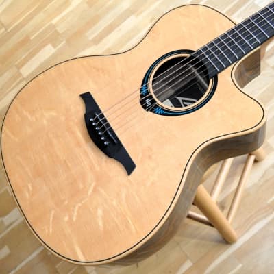 LAG Tramontane Hyvibe THV30ACE / Auditorium Cutaway Smart Guitar / by Maurice Dupont image 1