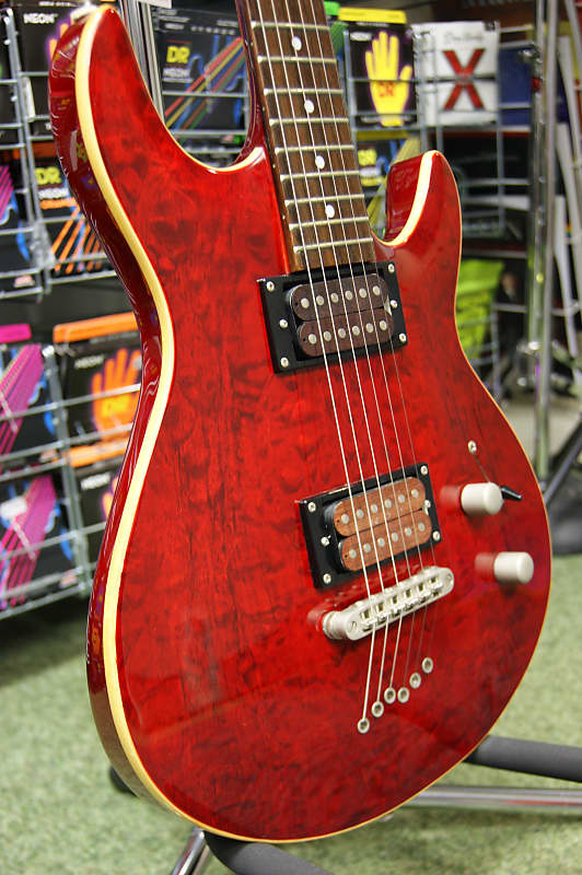 Shine electric guitar with quilted top in red - Made in Korea S/H image 1