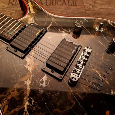 Guitarporn - This is insane! Zerberus Nemesis model with a top made of 0.2" real Black&Gold Marble image 10
