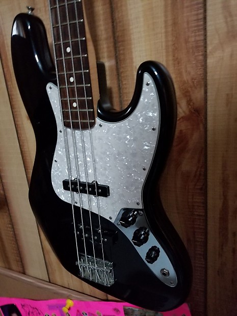 Black jazz bass shop with black pickguard