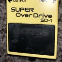 Boss SD-1 Super Overdrive guitar effects pedal green led light