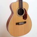 Guild M-240E small-body Acoustic-Electric Guitar, solid top. Includes bag.