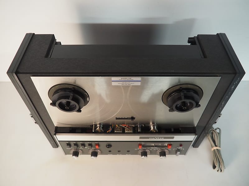 A Revox A77 reel to reel tape recorder mounted into a wheeled stand with a  Denoiser SNR 2000 Audio I