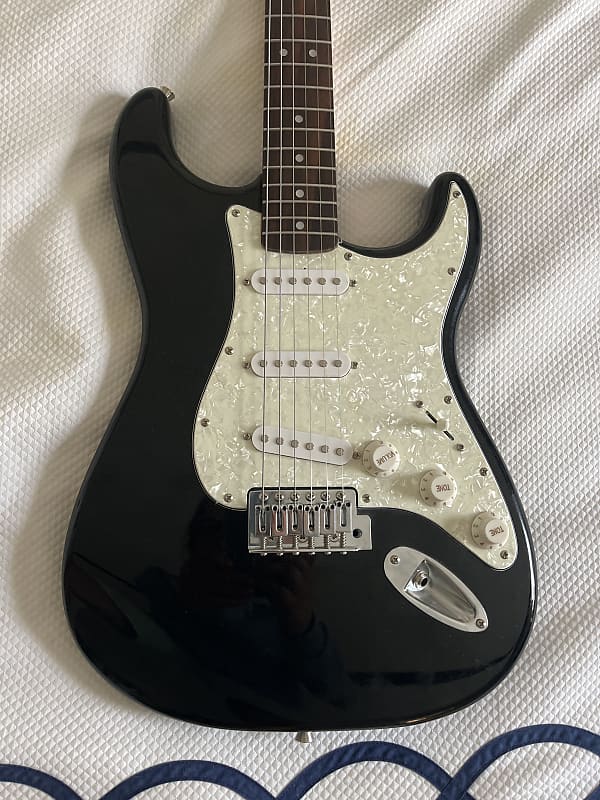 Fender Starcaster -- Metallic black with pearl/gold pickguard | Reverb