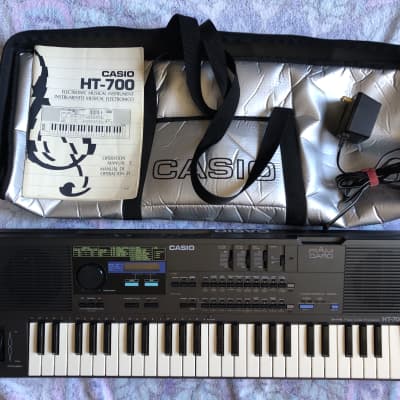 Casio HT-700 49 Mini Key Polyphonic Synthesizer with gig bag, power supply, manual