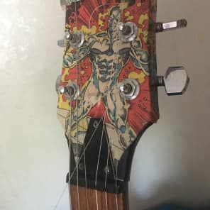 Old Antoria Guitar covered in 80's Sliver Surfer Comics, no pickups, worn frets. PROJECT image 6