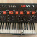 ARP Solus 1980 - Black and Orange with built in hardshell case