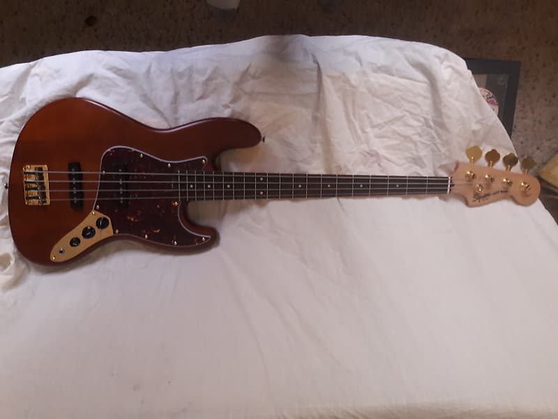 Fender Squier Jazz Bass 2004 Walnut new gold hrdwre and electrncs