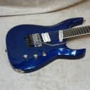 Jackson Wildcard SL27 EX 27 fret Soloist in blue sparkle w/ case