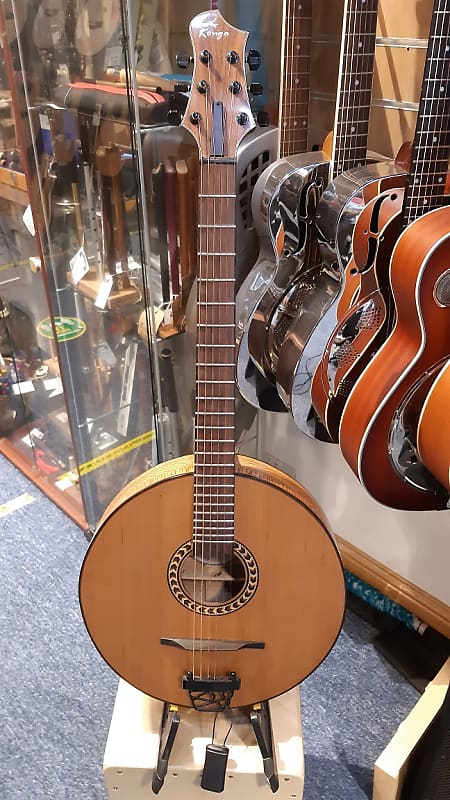 Round body store guitar