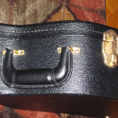lightly used genuine Gibson Dreadnought Hardshell Case from 2017 - Black Tolex Exterior, Wood Construction, Black Plush Padded Interior, Gold Colored Hardware, lid has Gibson Acoustic Logo, fits square or round shoulder dreadnought (NO guitar included) image 18