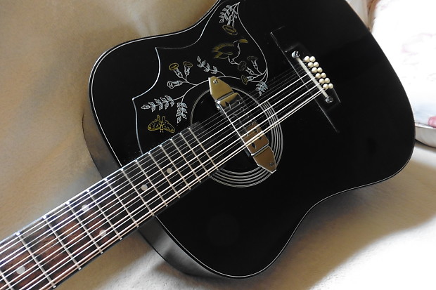 Hondo on sale hummingbird guitar