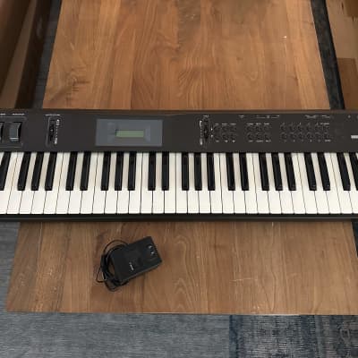 Korg X5 in good condition with power supply.