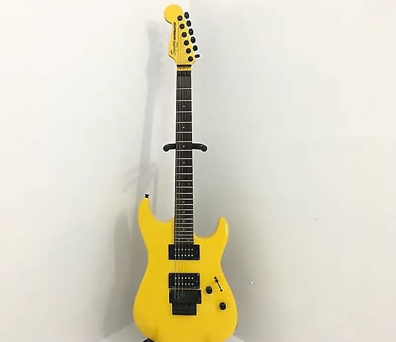 Squier graffiti outlet yellow