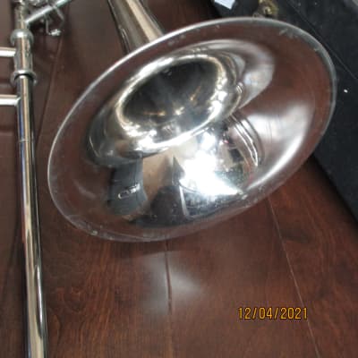 Trigger trombone with case and mouthpiece.  Silver image 5