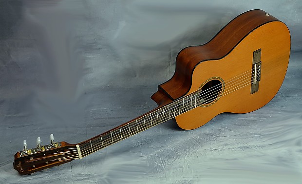 The Cordoba La Playa Travel Guitar Solid Cedar Top Steel Reverb