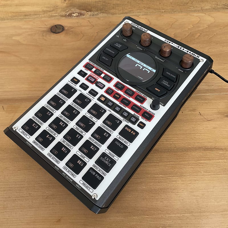 Roland SP-404MkII w/ SP303 Skin and Xray dust cover | Reverb