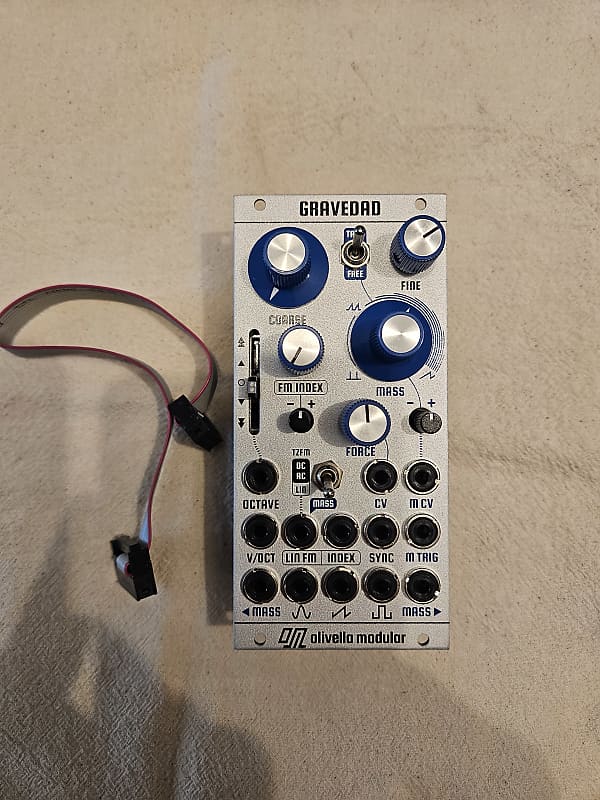 Olivella Modular Gravedad
