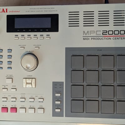 Akai MPC2000 MIDI Production Center  w/8 Outs and new screen
