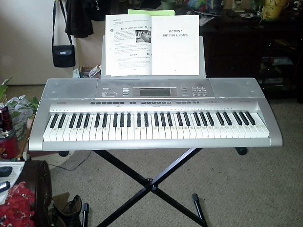 Casio keyboard silver deals