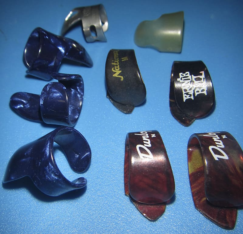 14 Assorted Finger and thumb picks Various colors/materials Reverb