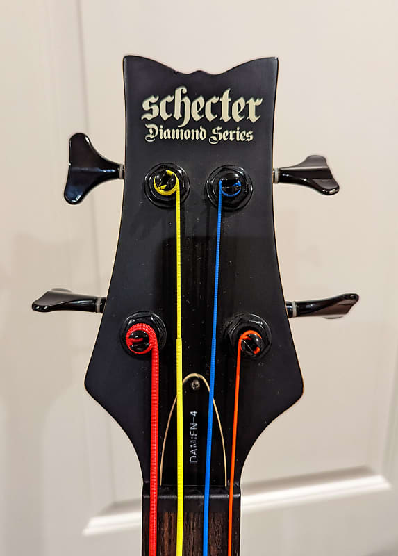 Schecter Damien-4 Diamond Satin Black / Goth Bat inlays | Reverb