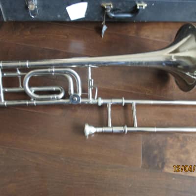 Trigger trombone with case and mouthpiece.  Silver image 2