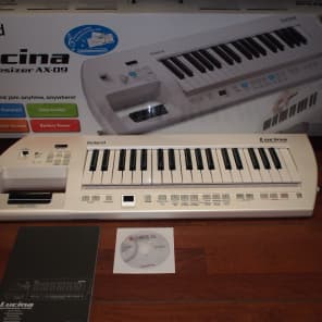Roland Lucina AX-09 Pearl White Keytar Synthesizer Keyboard