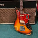 Vintage 1965 Fender Jaguar Sunburst electric guitar with original hardshell case