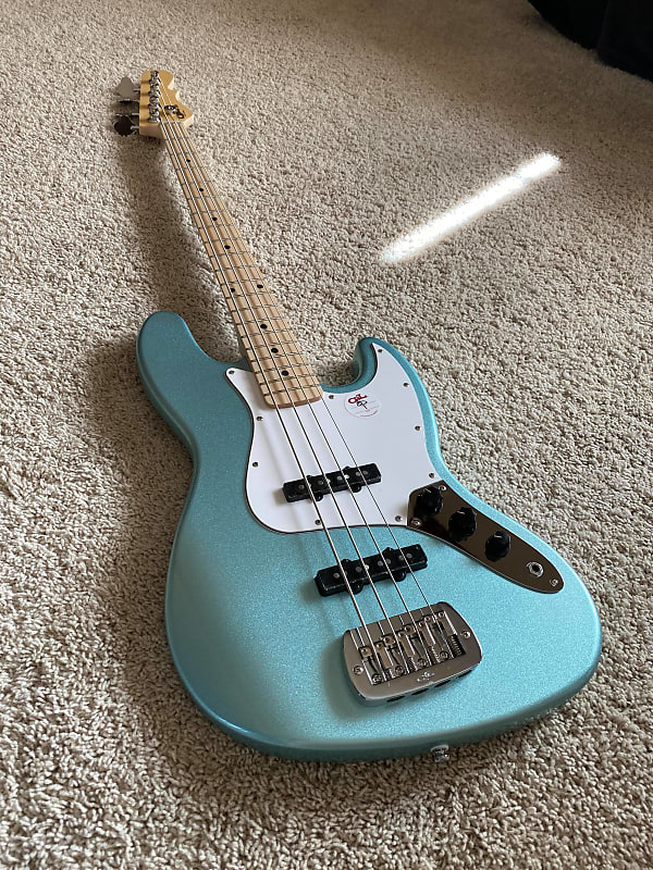 G&l tribute jb electric store bass turquoise mist