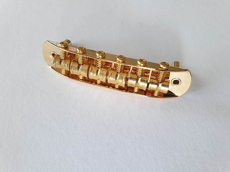 Jaguar Jazzmaster mustang upgrade bridge with brass adjustable saddles