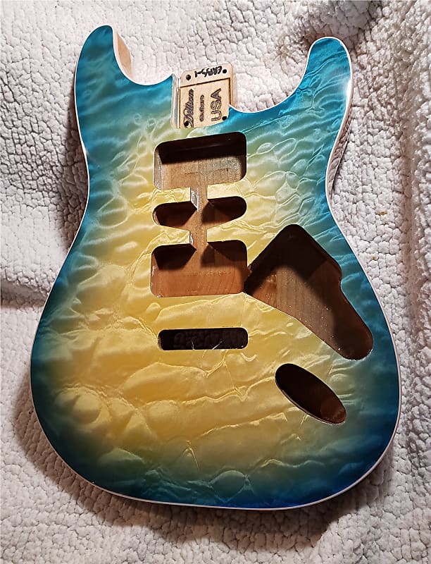 Stunning USA made,Double bound Alder body in Coral reef blue with 5A quilt maple top.Made for a Strat body# CRBS-1. Free pick guard while supplies last. image 1