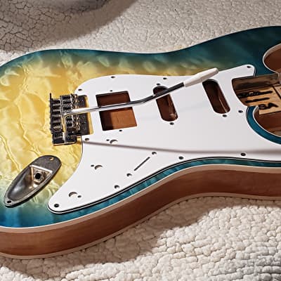 Stunning USA made,Double bound Alder body in Coral reef blue with 5A quilt maple top.Made for a Strat body# CRBS-1. Free pick guard while supplies last. image 11