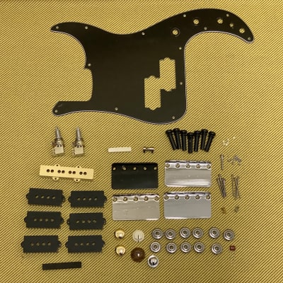 Assorted Bass Guitar Parts Lot P Bass Pickguard, Bridge Plates, Pickup Covers, String Guides, More
