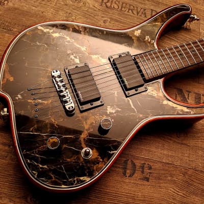 Guitarporn - This is insane! Zerberus Nemesis model with a top made of 0.2" real Black&Gold Marble image 2