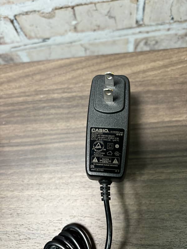 Casio PSM10A-095(VE) - ac/dc adaptor 9.5v 1.0A (+)pos center/ | Reverb