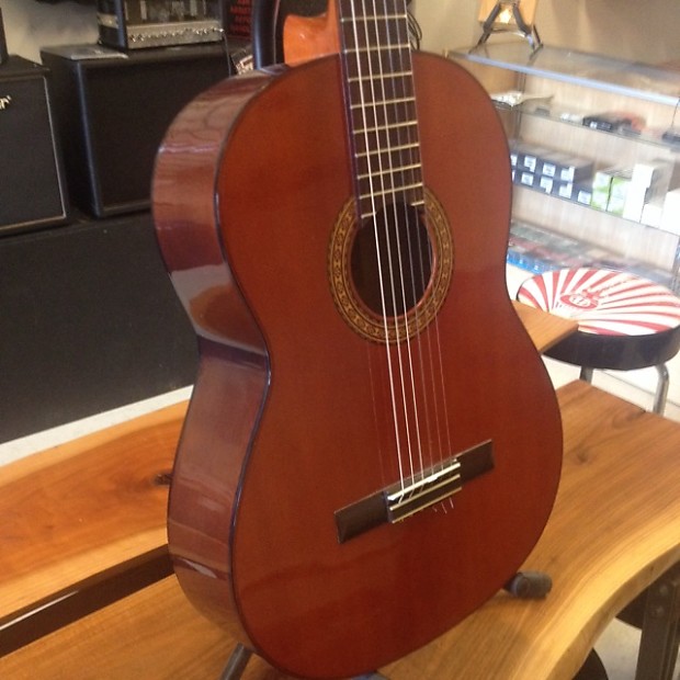 Yamaha g65 classical deals guitar