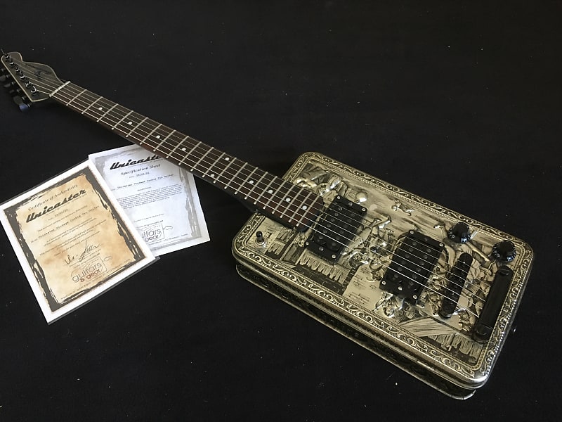 Unicaster Vintage Cookie Tin Guitar image 1