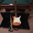 Vintage 1994 Fender Stratocaster Three Color Sunburst with hard case and guitar strap