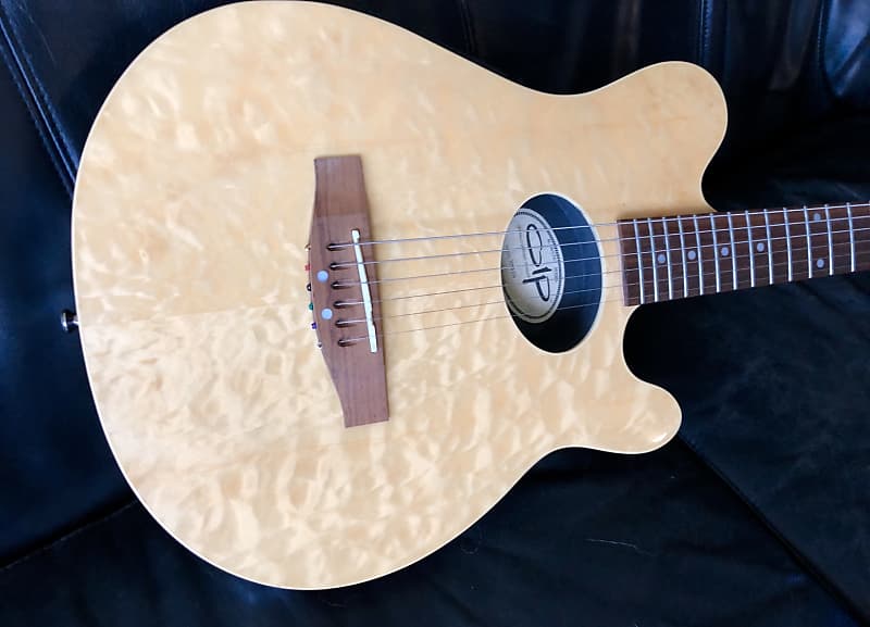 Music man acoustic guitar top