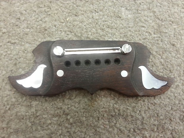 Gibson dove bridge top