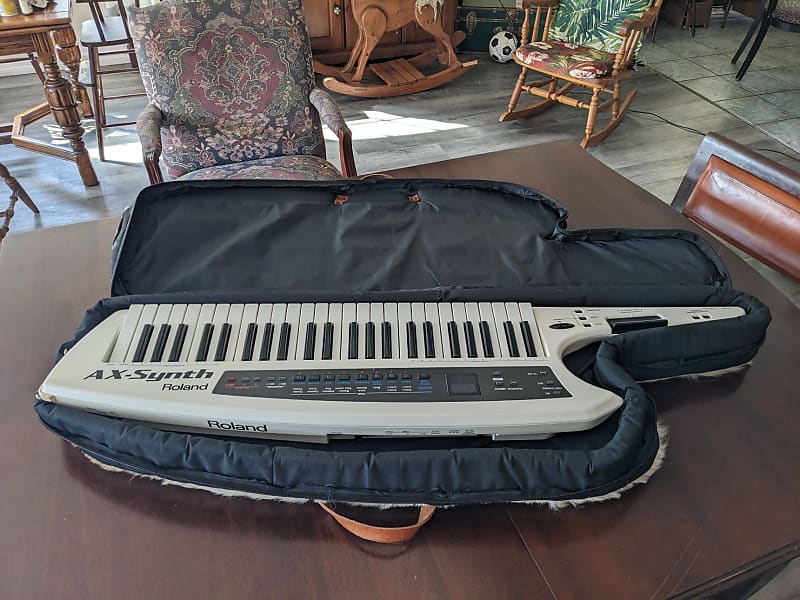 Roland AX-Synth + origin. Hard Case outlet & Ständer