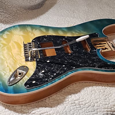 Stunning USA made,Double bound Alder body in Coral reef blue with 5A quilt maple top.Made for a Strat body# CRBS-1. Free pick guard while supplies last. image 10