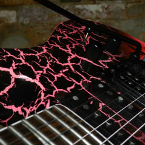 Kaman GTX-33 in Black and Pink Crackle finish. That's one of