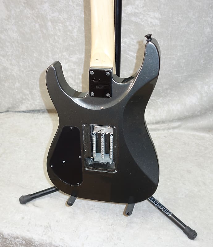 Jackson DK24 Dinky electric guitar in metallic gray finish