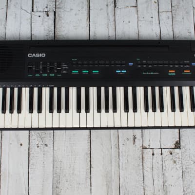 Casio Casiotone CT-607 Keyboard with Power Supply Manual and Original Box