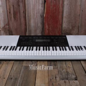 Casio WK-220 Electric Keyboard 76 Key Touch Sensitive with Digital 
