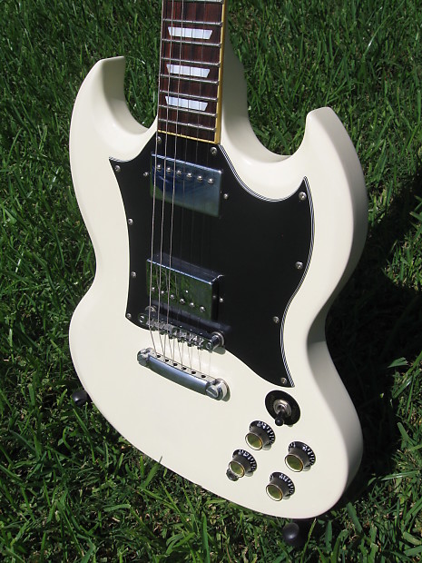 White MIJ Photogenic SG with Gibson deluxe tuners and open book headstock